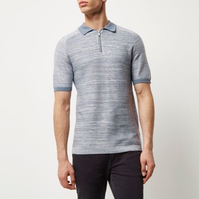 Light blue zip-up polo shirt